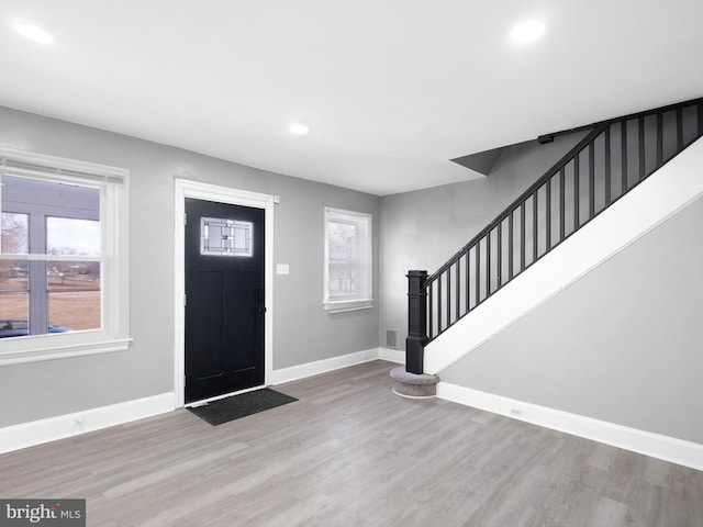 entrance foyer featuring light hardwood / wood-style floors