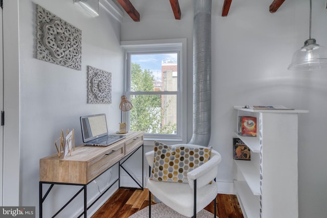 office space with beamed ceiling and dark hardwood / wood-style flooring