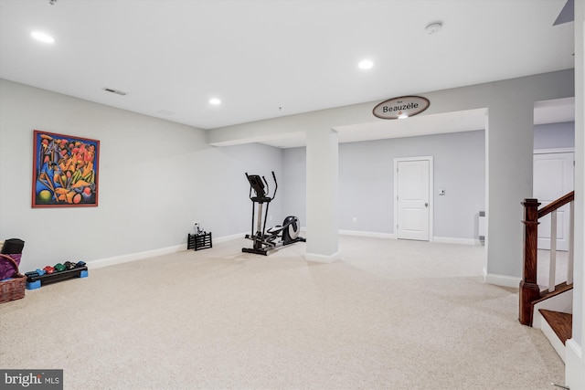 workout area featuring visible vents, recessed lighting, baseboards, and carpet