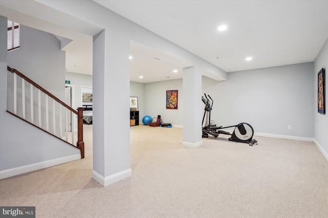 exercise area featuring recessed lighting, baseboards, and carpet