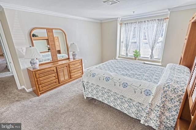 bedroom featuring baseboards, carpet flooring, visible vents, and crown molding