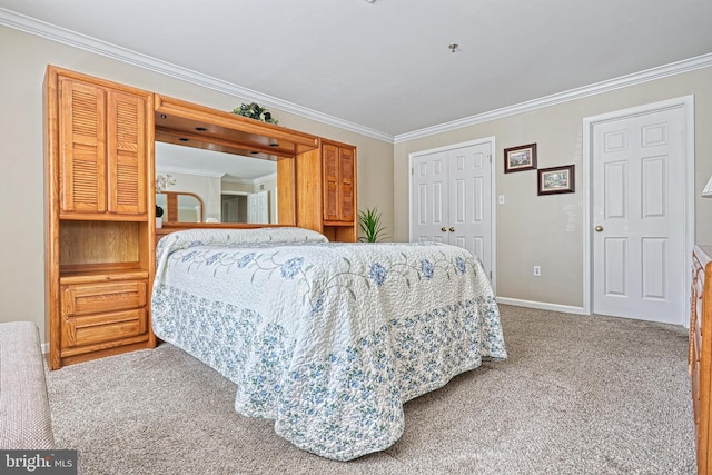 bedroom with carpet floors and crown molding