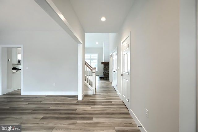 hall with dark hardwood / wood-style flooring