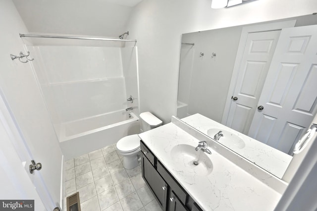 full bathroom with tile patterned floors, bathtub / shower combination, vanity, and toilet