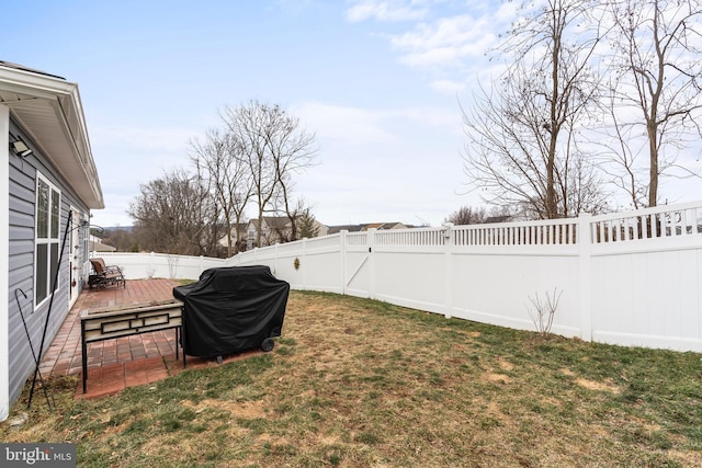 view of yard featuring a wooden deck