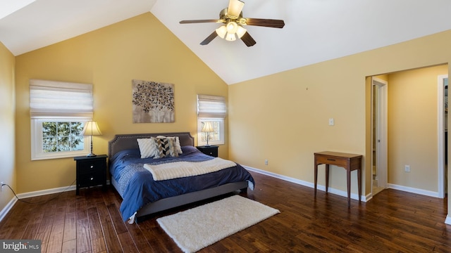 bedroom featuring a ceiling fan, wood finished floors, baseboards, and high vaulted ceiling