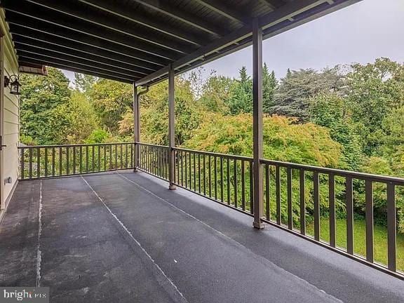 view of patio with a balcony