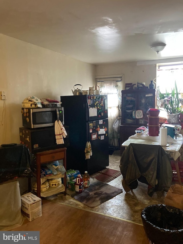 miscellaneous room with wood-type flooring