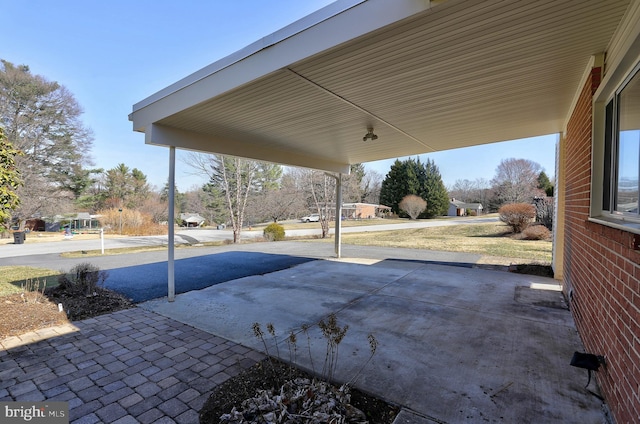 view of patio featuring a carport