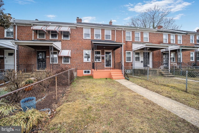 view of property featuring a front yard