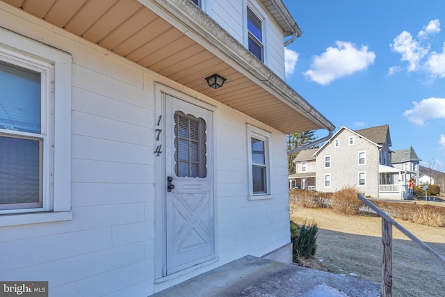 property entrance featuring a residential view