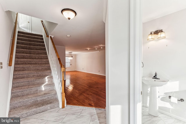 stairway with marble finish floor