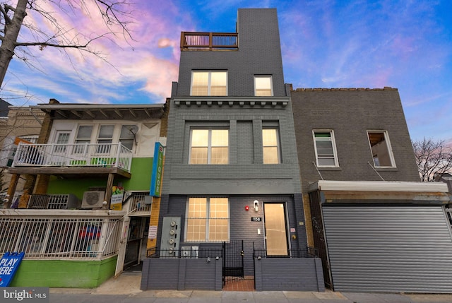 multi unit property featuring brick siding