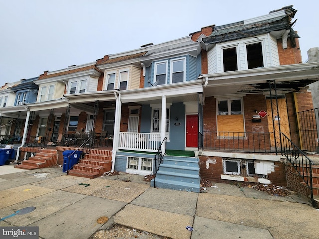 view of property with covered porch