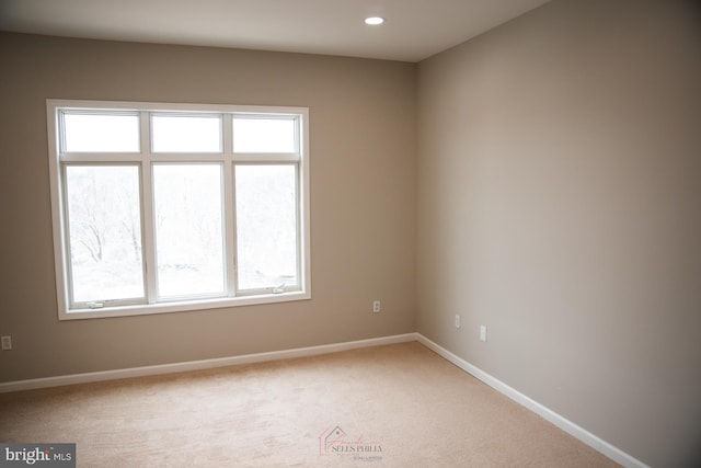 empty room with carpet flooring