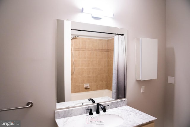 bathroom featuring vanity and shower / tub combo