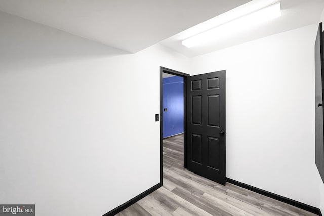 empty room with light wood-type flooring