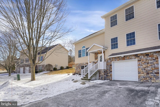 view of front of property with a garage