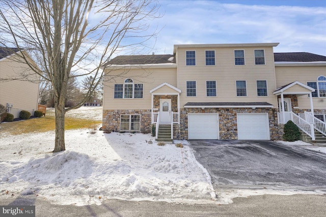 bi-level home featuring a garage