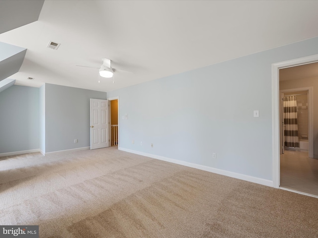 interior space featuring light carpet, baseboards, and visible vents