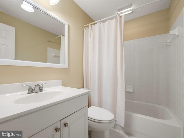 full bathroom featuring shower / tub combo, vanity, toilet, and tile patterned floors