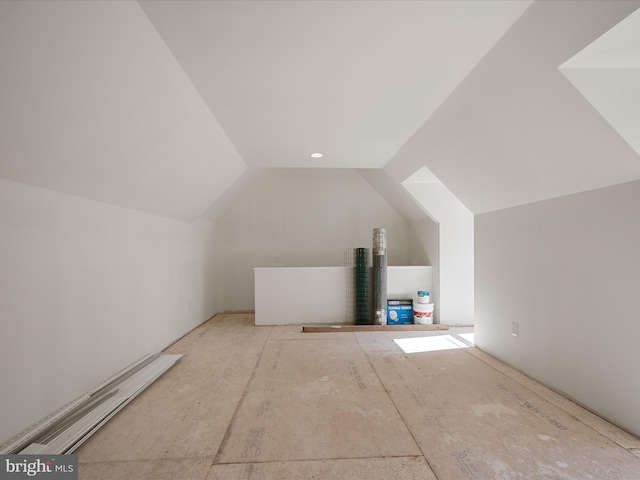 additional living space with lofted ceiling