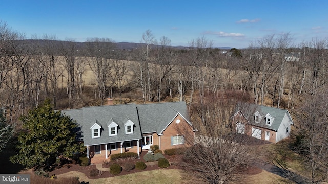 aerial view with a wooded view