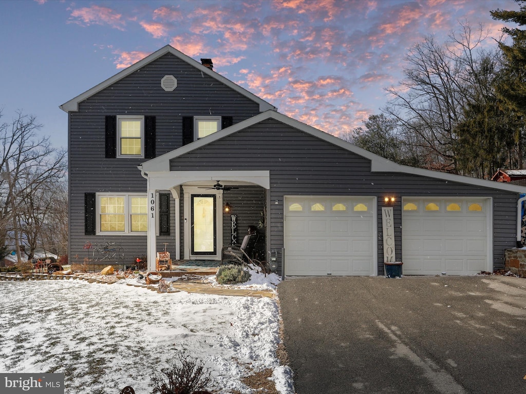 view of front of home with a garage