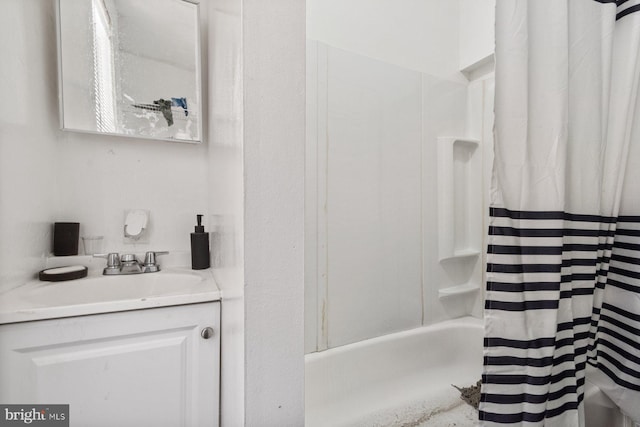 bathroom with vanity and shower / tub combo