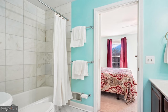 bathroom with visible vents, shower / tub combo with curtain, vanity, and toilet