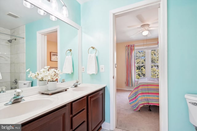 full bathroom with visible vents, a sink, and toilet