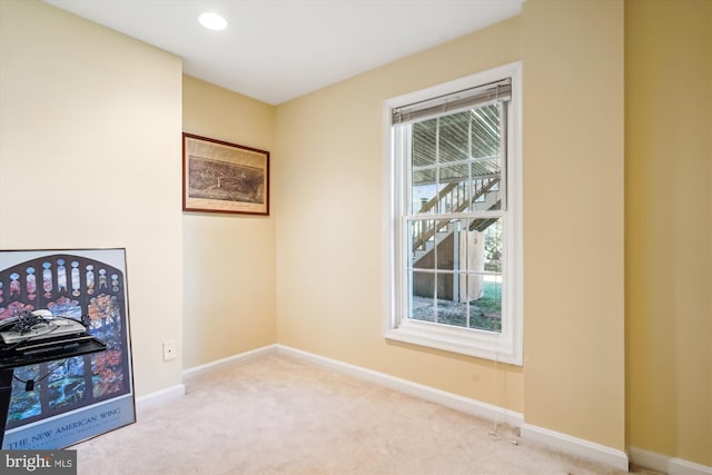 unfurnished room with carpet, baseboards, and recessed lighting