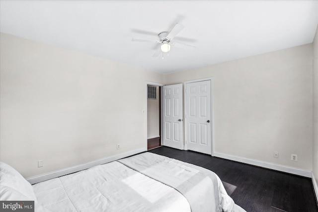 bedroom featuring ceiling fan and hardwood / wood-style floors