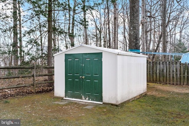 view of outdoor structure with a yard