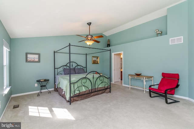 carpeted bedroom featuring vaulted ceiling and ceiling fan