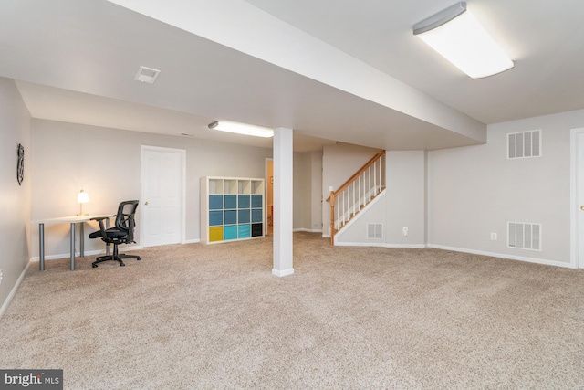 basement featuring carpet flooring