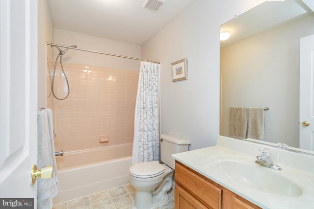 full bathroom featuring toilet, vanity, and shower / tub combo