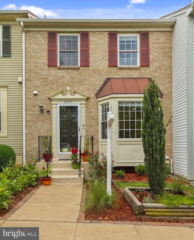 multi unit property featuring brick siding