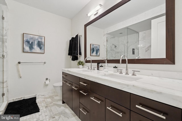 bathroom with toilet, a shower with door, and vanity