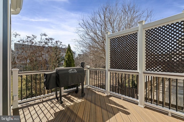 wooden deck with area for grilling