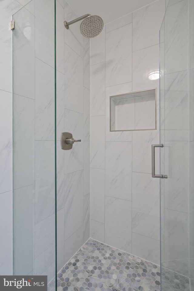 bathroom featuring a stall shower