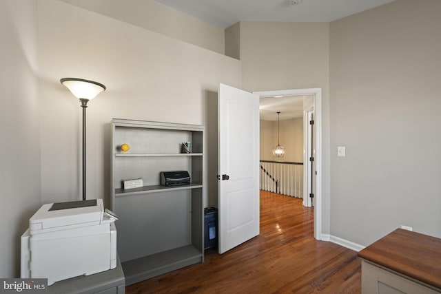 home office featuring dark wood finished floors and baseboards