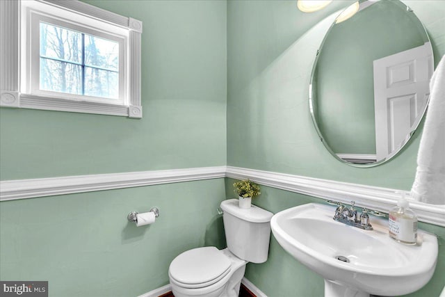 bathroom with a sink and toilet