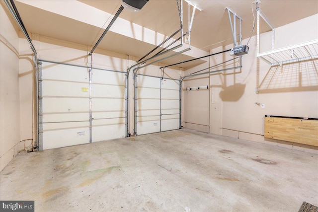 garage featuring a garage door opener