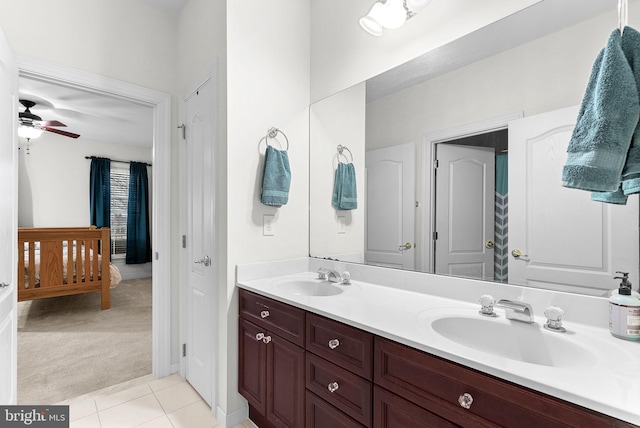 9801 Alydar Ct, Nokesville, VA 20181 - bathroom with tile patterned flooring, double vanity, ceiling fan, and a sink
