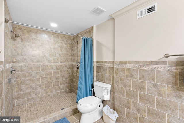 9801 Alydar Ct, Nokesville, VA 20181 - full bathroom with a shower stall, tile walls, and visible vents