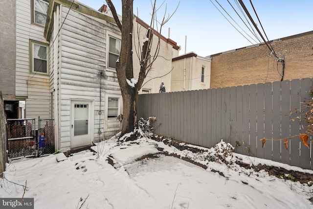 view of yard covered in snow