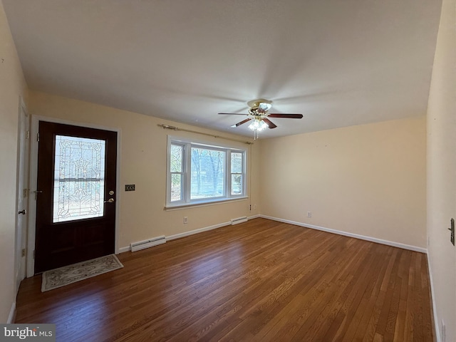 entrance foyer with ceiling fan, dark hardwood / wood-style flooring, and a baseboard radiator