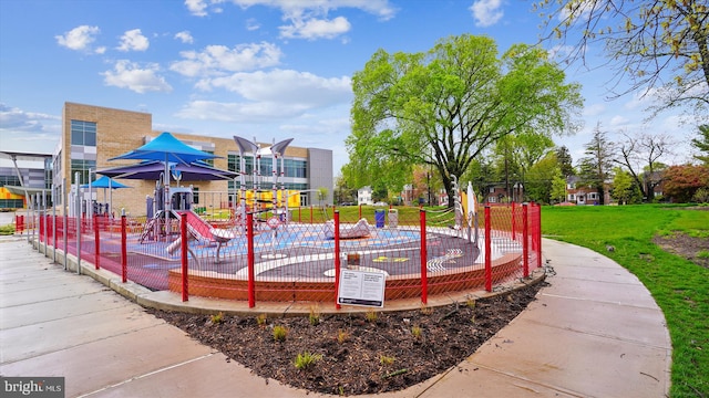 community play area featuring a yard