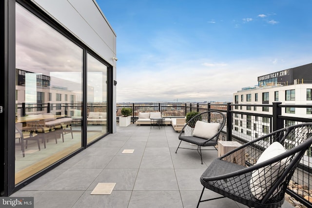 balcony with an outdoor hangout area